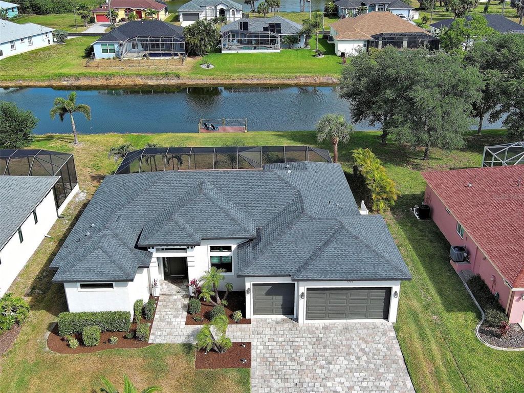 Photo of 1082 Boundary Boulevard, Rotonda West, FL 33947 (MLS # D6147184)