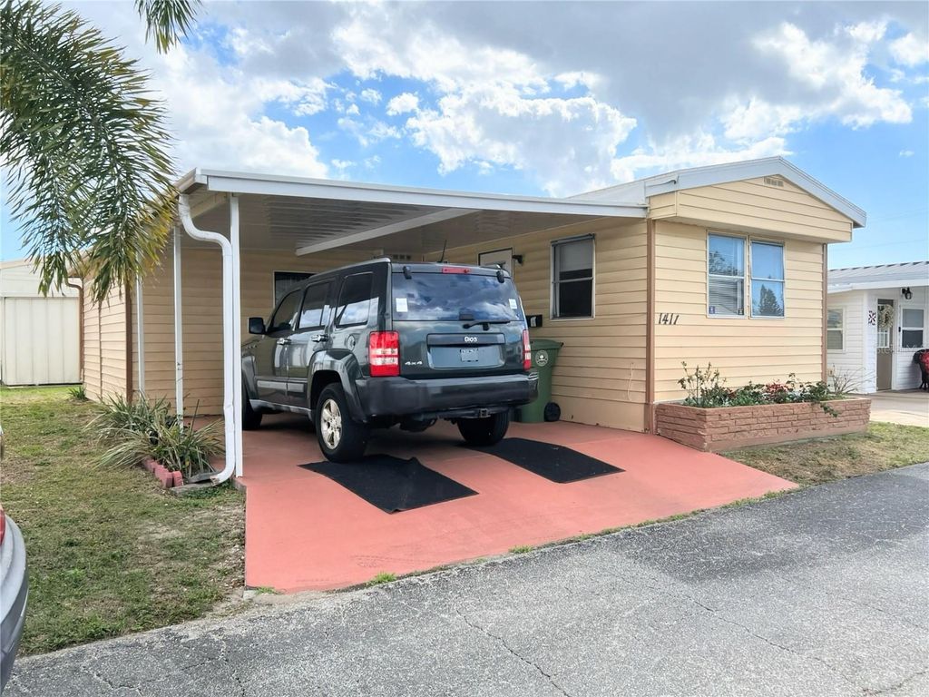 Photo of 1411 21st Avenue Drive W, Bradenton, FL 34205 (MLS # A4685348)
