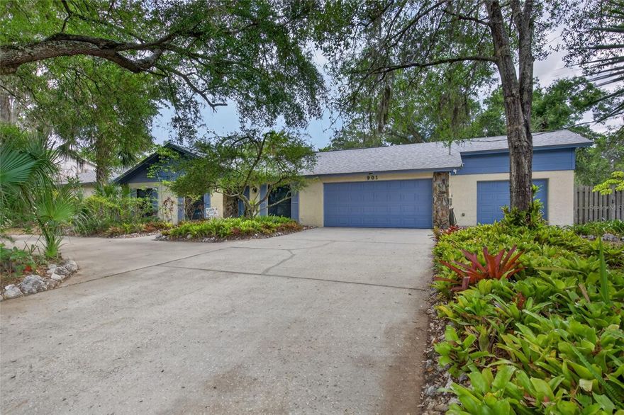 Welcome to a truly enchanting home that radiates beauty and charm!  Recognized by the Temple Terrace Garden as having the 'Best Landscaping in Temple Terrace' for January 2024, this remarkable property features stunning grand oak trees that create an inviting and captivating street presence.  This distinctive quality sets it apart from other homes in the area, making it an absolute must-see for any discerning buyer.  This home also boasts a thoughtfully designed multi-generational layout, complete with a cozy in-law suite, perfect for family living or hosting guests. 

As an added bonus, the property backs onto a Gopher Tortoise conservation area, offering a unique connection to nature and wildlife right outside your door.  Don’t miss the opportunity to experience all the charm and allure this exceptional home has to offer!

As you step inside, you are welcomed by a thoughtfully designed open-concept layout that seamlessly merges the living room, dining room, and an elegantly updated kitchen, complete with a charming dinette area.  The inviting flow of the home guides you either into a spacious family room or to a magnificent screened-in porch. 

This outdoor sanctuary, perfect for entertaining, boasts generous space for a stylish L-shaped sofa and a dining table, allowing you to savor the beauty of nature just outside your door.  The harmonious blend of the screened-in porch and the wrap-around L-shaped pool creates an idyllic setting for outdoor living, offering a unique and delightful experience that new homeowners will cherish for years to come.

Revel in the company of vibrant birds, fluttering butterflies, and the gentle presence of protected gopher tortoises, all framed by the lush, dedicated land maintained by the City of Temple Terrace. This idyllic setting is a rare gem, adding to the allure of this extraordinary home!

The thoughtfully designed bedroom layout boasts a luxurious master suite that exudes elegance, complete with an expansive walk-in closet and a spa-like bathroom.  This sanctuary features a sumptuous tub and an indulgent shower, equipped with its own water heater for a truly pampering experience.  

This stunning home is impeccably move-in ready, designed for enjoyment both indoors and outdoors.  With a brand-new roof installed in summer 2024, new hurricane-proof windows in 2025, and a state-of-the-art air conditioning system added in 2023, every detail has been thoughtfully considered.  The renovated pool and patio, completed in 2020, create a perfect oasis for relaxation and entertainment.  Nestled in a non-flood zone, this property alleviates your worries with no flood insurance requirements, and you’ll enjoy the freedom of no HOA or CDD fees.  The neighborhood is renowned for its outstanding charter schools and access to International Baccalaureate programs.  With the idyllic Temple Terrace Golf and Country Club just around the corner and golf cart-friendly streets, leisure and recreation are at your fingertips.  This prime location offers convenient access to USF and major highways (I-75, I-4, and I-275), as well as proximity to the vibrant Uptown Tampa area, Busch Gardens, and the VA and Moffitt Hospitals.  Plus, you’re just a short drive away from the stunning beaches that await you.  Discover the magic of Temple Terrace and make this dream home yours!
