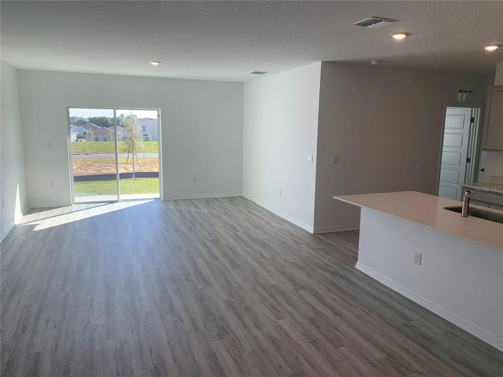 Photo of 3425 Nettle Loop, Tavares, FL 32778 (MLS # O6392973)