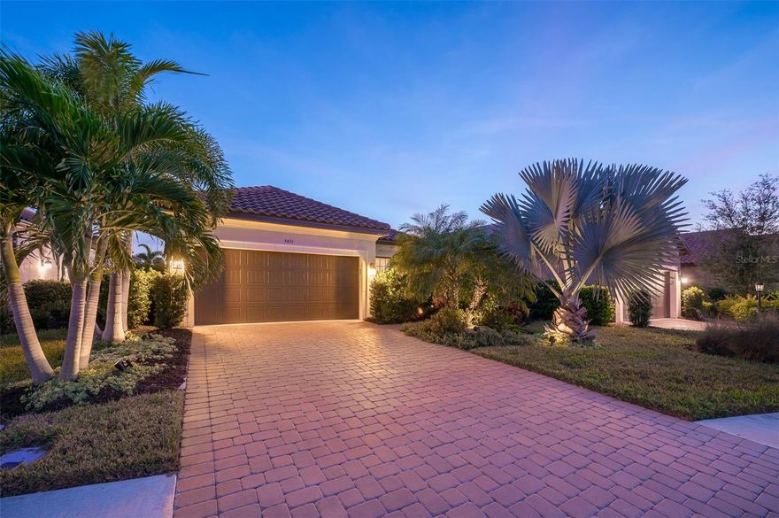 Experience waterfront living at its finest in this pristine Arezzo floor plan featuring 3 bedrooms, 2 baths, and a versatile den, all enhanced by an extended lanai showcasing breathtaking, unobstructed water views from a premium southern-exposure lot. Nestled within the gated Esplanade on Palmer Ranch community, this meticulously maintained home offers an efficient open floor plan with modern kitchen appointments including white maple cabinets, quartz countertops, and gas cooking, while solar panels with battery storage keep electric bills averaging just $35 monthly. The property features extensive custom landscaping, remote-controlled hurricane screens, whole house water filtration, and numerous premium upgrades throughout. Beyond the home itself, residents enjoy an exceptional resort-style lifestyle with state-of-the-art fitness center, wellness services, resort-style pool and spa, pickleball, tennis, bocce courts, dog parks, walking paths with private Legacy Bike Trail access, and the exclusive Bahama Bar offering restaurant and full-service bar—all within a vibrant community offering a full calendar of activities and social opportunities. This is more than a home—it's your gateway to the waterfront lifestyle you've been dreaming of. Remote Controlled Hurricane screens/ shutters, Solar power system with battery storage.