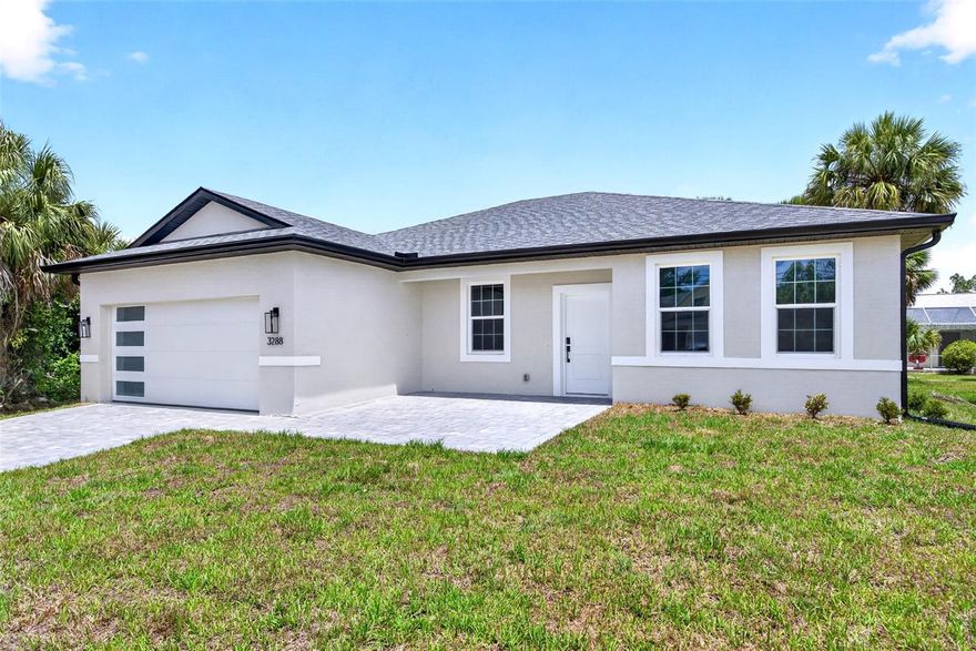 JUST COMPLETED! BRAND NEW 4 BEDROOM, 3 BATH, 2-CAR GARAGE HOME IN NORTH PORT! Stunning new construction home, designed with thoughtful details for comfort and style. Open floor plan with high ceilings, luxury vinyl flooring, contemporary and recessed lighting plus much more. Well-appointed kitchen offers soft-close cabinetry, quartz waterfall countertops, tile backsplash, stainless steel appliances, closet pantry and center island overlooking the dining and living areas. Generous primary bedroom with his and her walk-in closets and en-suite bath featuring dual sinks, LED mirror, and walk-in tile shower. Split floor plan provides guests with plenty of privacy, featuring 3 additional bedrooms, a full guest bath, and one bedroom with its own ensuite bath perfect for hosting guests or family. Outdoor entertaining area features covered lanai and plenty of room for a pool in the backyard. Additional highlights include impact windows and doors, smart thermostat, water filtration system, epoxy garage flooring, and paver driveway. Nestled on a quiet street you'll enjoy the peace of suburban living while still being just minutes away from shopping, dining, and everyday conveniences with easy access to I-75. With North Port's affordability, friendly atmosphere, and strong community feel it's easy to see why so many are choosing to call this area home. Don’t miss this opportunity! Schedule your private showing today!