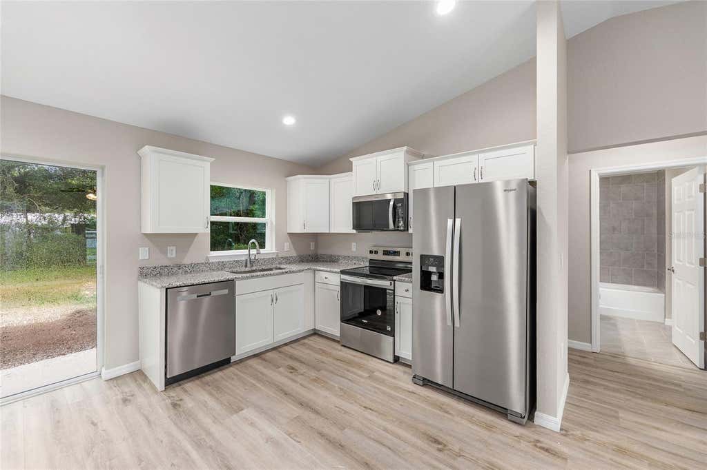 Photo of 21812 SW Rainbow Lakes Boulevard, Dunnellon, FL 34431 (MLS # OM730102)
