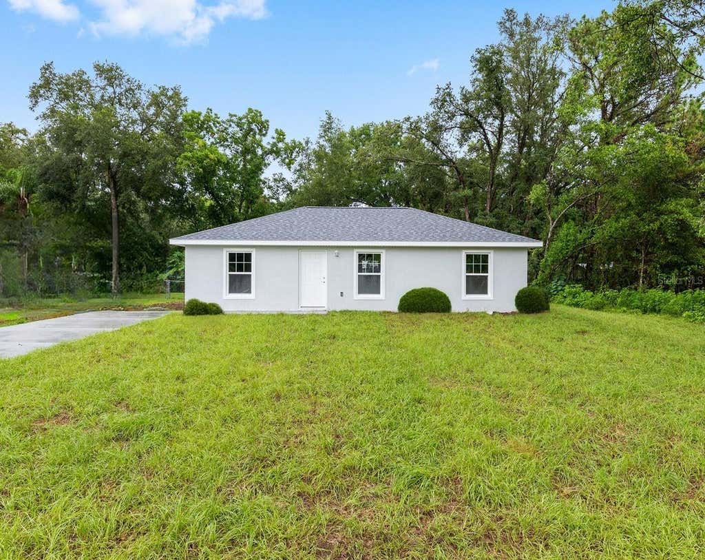 Photo of 21812 SW Rainbow Lakes Boulevard, Dunnellon, FL 34431 (MLS # OM730102)