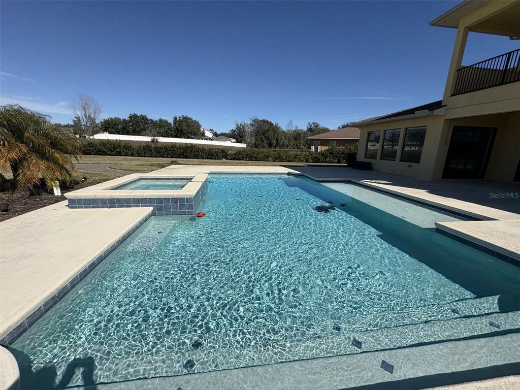 Photo of 17914 Howsmoor Place, Lutz, FL 33559 (MLS # TB8459212)