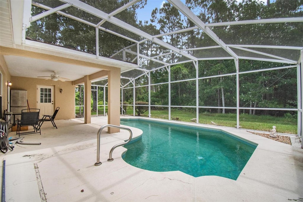 Photo of 17 Ebb Tide Drive, Palm Coast, FL 32164 (MLS # FC319048)