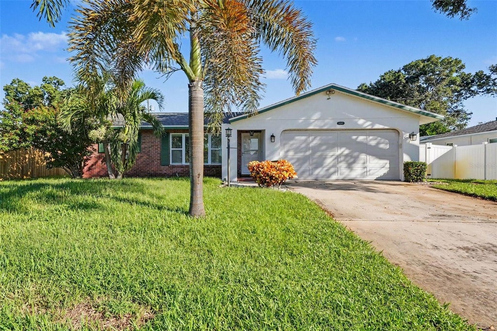 Photo of 14161 Hetrick Circle N, Largo, FL 33774 (MLS # TB8558176)