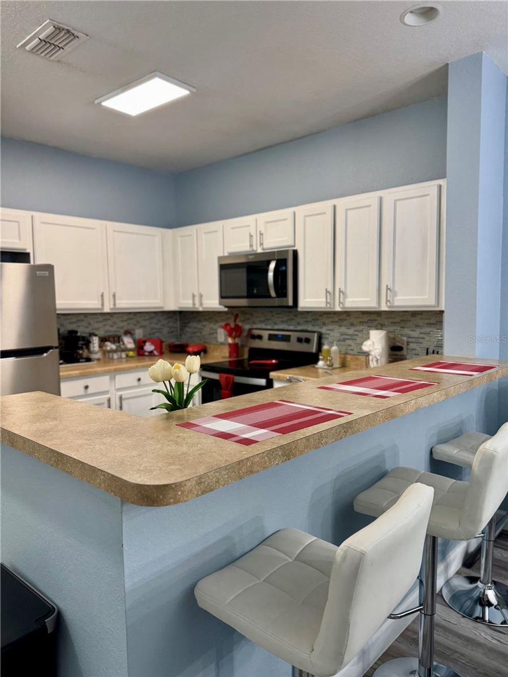 Photo of 3175 Feltrim Place #402, Kissimmee, FL 34747 (MLS # S5138764)