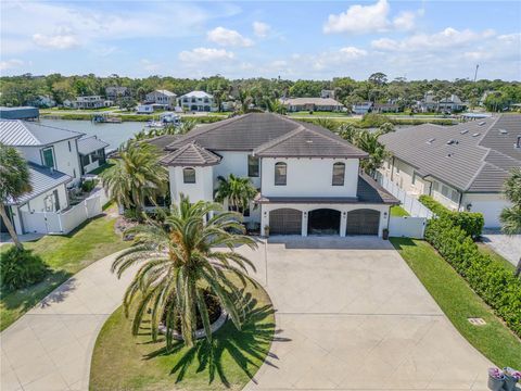 Photo of 1212 Commodore Drive, New Smyrna Beach, FL 32168 (MLS # NS1084456)