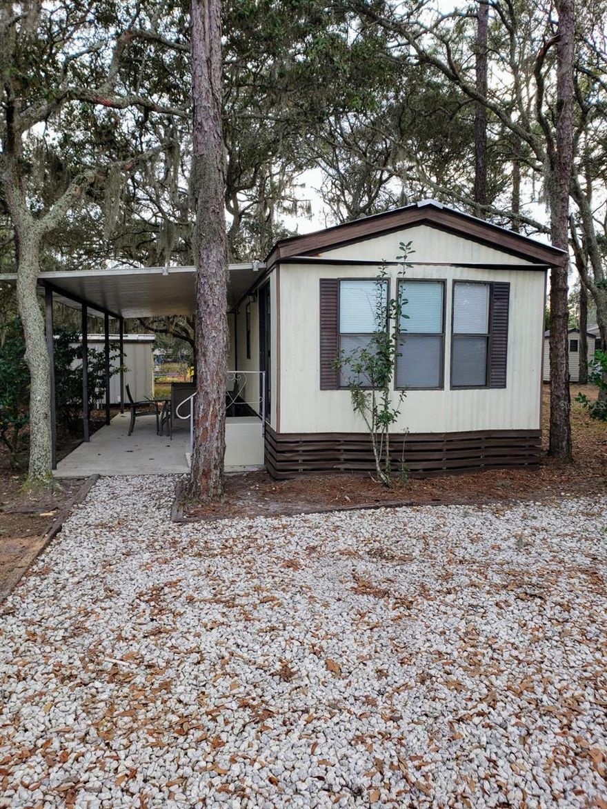 YOU OWN THE LAND!  Currently rented on Airbnb. Owner pays all utilities.  Nice investment property fully renovated about 1 year ago.  Vinyl plank floor throughout all.  Beautiful tiled shower.  Kitchen has had new granite counter tops installed since these pictures were taken.  1 bedroom, 1 bath park model,  Washer and dryer in shed.  Shed allows extra storage space.  Covered patio.  Near community pool and putt putt golf and community Trading Post, which is a convenience store and sandwich shop.