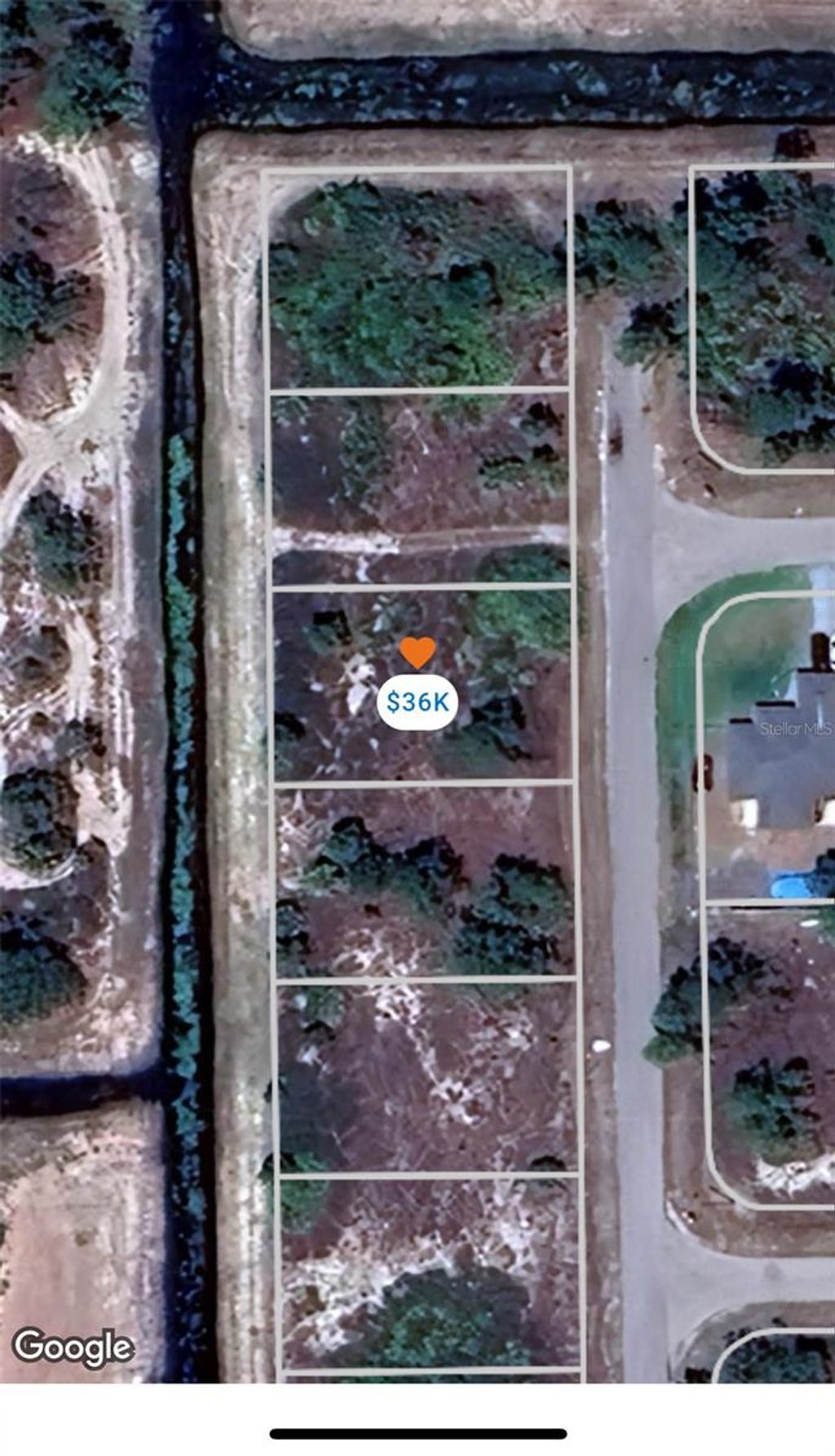 Photo of 1104 Genoa Avenue S, Lehigh Acres, FL 33974 (MLS # O6304004)