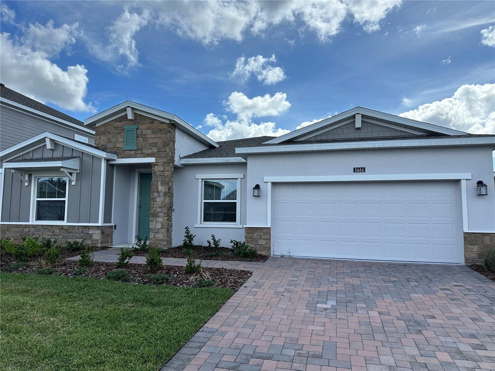 Welcome to this spacious single-story home located in the beautiful new community of Bridgewalk. This thoughtfully designed residence features four bedrooms, three full bathrooms, and a two-car garage, along with two additional flex rooms that can easily adapt to your lifestyle—whether as an office, gym, or playroom. The open-concept layout seamlessly connects the kitchen, dining, and family areas, leading to a covered lanai perfect for relaxing and enjoying Florida’s outdoor living. The owner’s suite offers a luxurious retreat with a spa-inspired bathroom and a large walk-in closet. Residents of Bridgewalk enjoy resort-style amenities including a sparkling pool, modern fitness center, pickleball court, park, and a community dock.