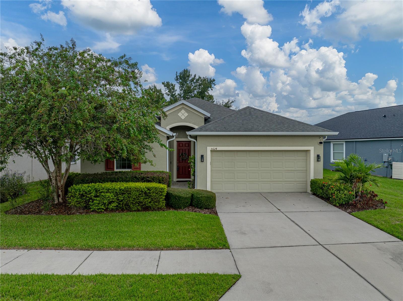 Welcome to your new home located in The Villages at BridgeWater in Lakeland, situated perfectly within a short distance from several of Florida’s top attractions. This waterfront, suburban community is surrounded by five signature lakes, offering a breathtaking retreat and convenient lifestyle. From amenities inclusive of swimming, sunbathing, walking trails, canoeing, fishing, wildlife observation and tennis to nearby attractions such as the renown and historic Downtown Lakeland, Orlando, Disney, Universal Studios, Downtown Tampa and an abundance of restaurants and retail – the location of The Villages at BridgeWater is known to be simply one of the best! As remarkable as the community is, the true highlight awaits within the residence itself, where comfort, style and thoughtful design come together seamlessly. From the moment you enter this 4-bedroom, 2-bathroom, home you are welcomed by an impressive lake view that immediately elevates the sense of elegance. The expansive primary suite offers a large walk-in closet and a spa-inspired en-suite bathroom, complete with dual vanities, private water closet, a soaking tub and a walk-in shower. The kitchen showcases stainless steel appliances, shaker cabinets, durable Corian countertops, eat-in space and separate dining area. Designed with comfort and functionality in mind, the home presents luxury vinyl flooring throughout, a split and open floor plan, 2-car garage and a screen-enclosed porch. Whether envisioned as a place to entertain with ease or to unwind in complete comfort, this residence provides the ideal setting for a truly refined lifestyle and is truly a must see!