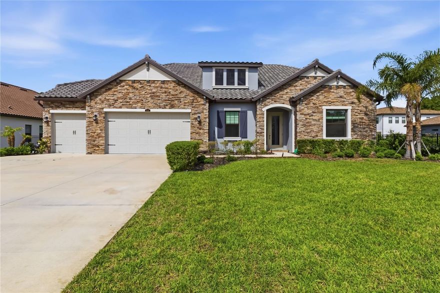Luxuriously upgraded EAST-facing home in gated Cordoba Estates on a rare 0.62-acre lot backing to conservation with no rear neighbors. *This 3,033 sq ft home features 4 bedrooms, 3 baths, 3-car garage, private office with French doors, and a versatile flex room (office/gym/nursery). Enjoy ceramic tile throughout, high ceilings, and tray accents. Gourmet kitchen with 42” soft-close cabinets, quartz countertops, walk-in pantry, under-cabinet lighting, and spacious dining area. Expansive primary suite with spa-like bath, dual vanities, garden tub, large walk-in shower, and 2 custom walk-in closets. Includes whole-house water softener, RO system, and HVAC UV filtration. Massive backyard with serene conservation views. Resort-style amenities: pool, splash pad, playground, tennis/basketball courts, dog park. Prime location near Tampa Premium Outlets, Moffitt, airport & I-75/I-275. All measurements and details are approximate. Please verify if important.