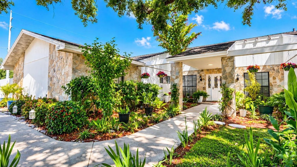 Photo of 1307 Normandy Circle, Palm Harbor, FL 34683 (MLS # TB8500489)