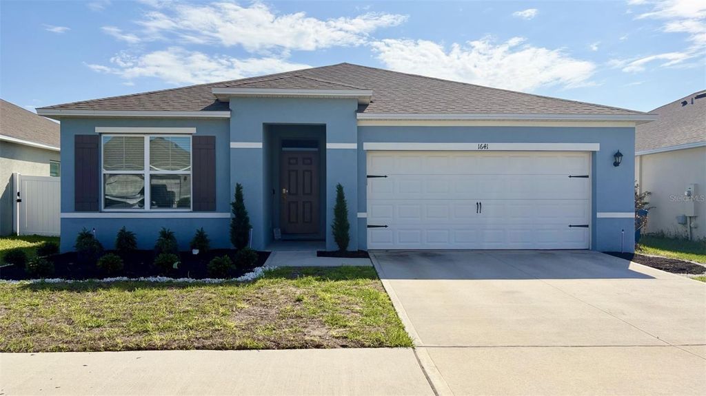 Photo of 1641 Buttonwood Way, Haines City, FL 33844 (MLS # G5109616)