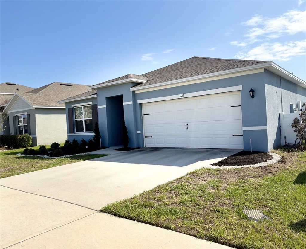 Photo of 1641 Buttonwood Way, Haines City, FL 33844 (MLS # G5109616)