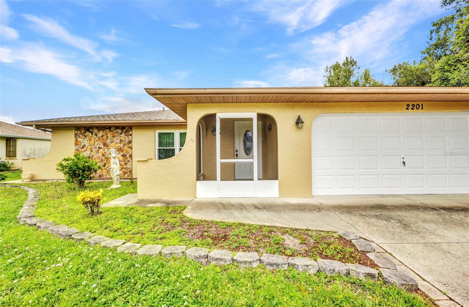 Welcome to 2201 Hyatt Dr., a beautifully maintained single-family home in a highly desirable Florida location. Perfect for seasonal or new home buyers, this residence features 2 bedrooms, 2 bathrooms, and a spacious garage. The updated kitchen with wood cabinets and granite counter tops is the center of this home which offers a formal living and dining area and a cozy family room. A rare find is that this home has two screened lanais, plus a screened front porch—for a family this opens opportunities for a play room or workout space or they are ideal for just enjoying Florida’s warm weather and outdoor living. Recent updates include impact windows and a new roof installed in 2023, offering peace of mind. Located near all the amenities along Murdock Circle, with easy access to shopping, dining, and services. Just a short drive to the beaches of Boca Grande and Englewood, it’s perfect for recreation and relaxation. This prime location combines a peaceful neighborhood with convenient access to the area’s best attractions. Schedule your private tour today and discover the lifestyle this wonderful home provides! NOT IN A FLOOD ZONE.