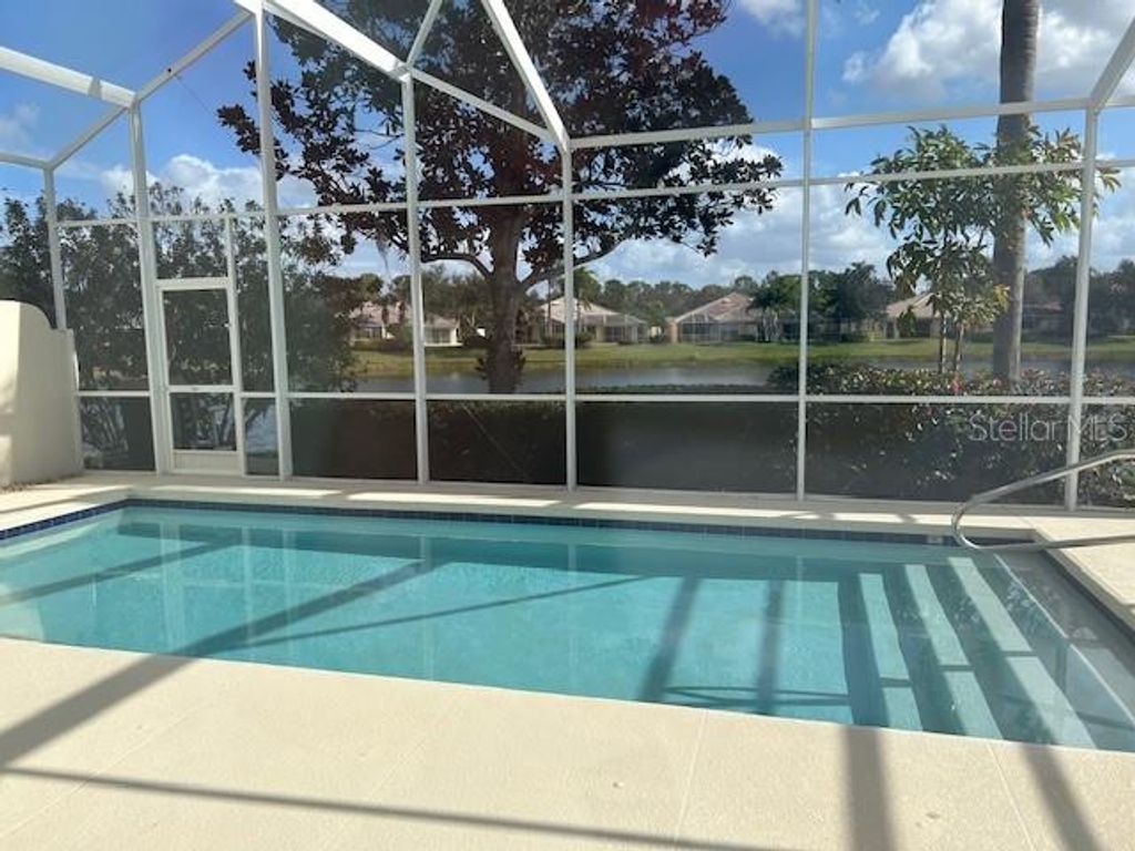 Photo of 7681 Uliva Way, Sarasota, FL 34238 (MLS # A4676986)