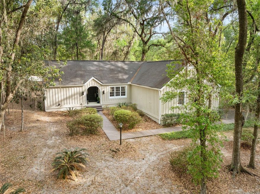 Located in the highly desirable Laurel Park section of Haile Plantation, this beautifully maintained 3-bedroom, 2-bath home blends timeless charm with thoughtful modern updates. The bright, open-concept layout seamlessly connects the living, dining, and kitchen spaces, creating an inviting atmosphere for both everyday living and entertaining. French doors lead to the backyard, offering an easy transition to outdoor gatherings.

The upgraded kitchen is both stylish and functional, featuring quartz countertops, a glazed ceramic tile backsplash, stainless steel appliances, a European-style hood vent, and a breakfast bar island with a built-in microwave.

A split-bedroom floor plan provides added privacy while maintaining a light and airy feel throughout the home. Vaulted ceilings and a cozy brick-hearth fireplace anchor the main living area, while a convenient storage nook just off the garage entry adds everyday practicality.

The spacious primary suite offers a relaxing retreat with an updated bathroom featuring a walk-in glass and tile shower. The guest bathroom has also been tastefully updated. Additional highlights include a laundry area with washer and dryer access, ample storage, and a spacious two-car garage.

Major updates have already been completed for peace of mind, including a roof (2019), full plumbing replacement (2019), hot water heater (2019), new driveway (2020), HVAC system (2020), and newly painted exterior (2026).

Combining modern updates, classic character, and a prime location, this home offers the best of Haile Plantation living in one of Gainesville’s most sought-after communities.