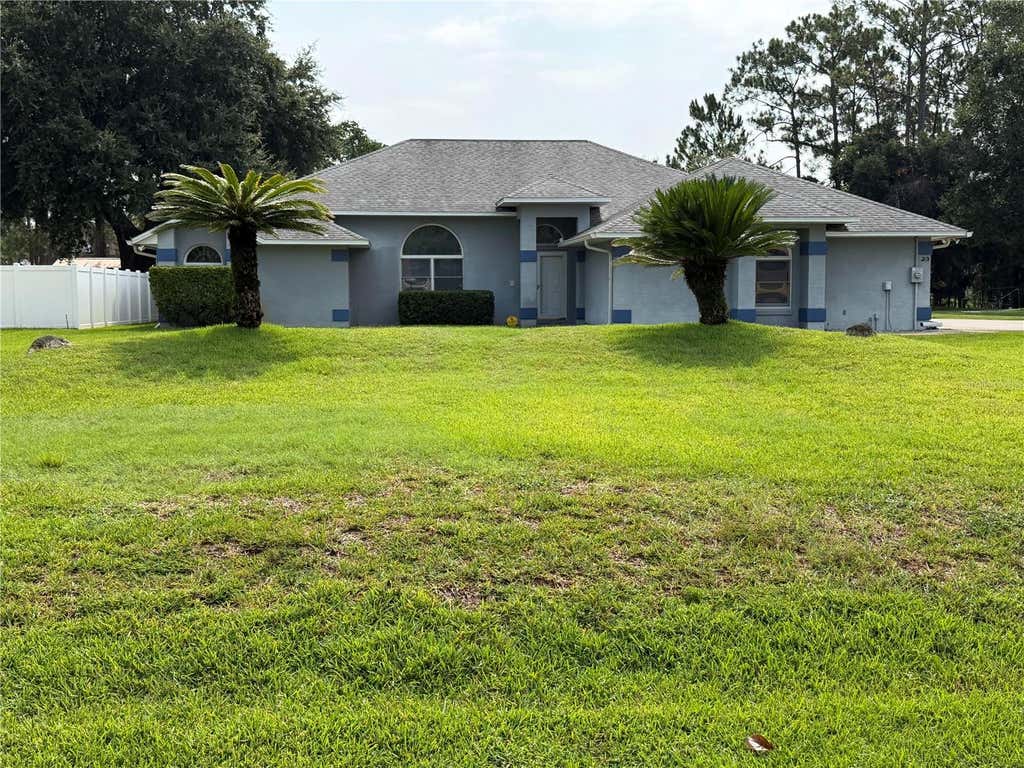 Photo of 23 Wellstream Lane, Palm Coast, FL 32164 (MLS # O6431873)