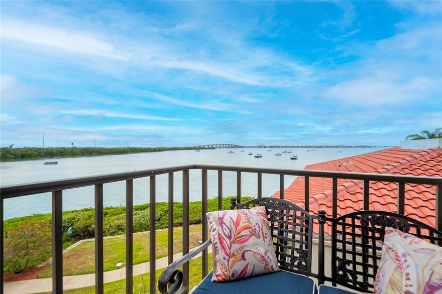 Spectacular waterfront living on Boca Ciega Bay defines this beautifully updated 2-bedroom, 2-bath, 1050 sq-ft condo in the desirable Bahia Del Mar community.  From the moment you enter, you are greeted by sparkling blue water views framed by large windows and sliding glass doors (ALL NEWLY REPLACED IN 2025) that fill the home with natural light. The open floor plan seamlessly connects the kitchen, dining, and living areas – ideal for entertaining or simply enjoying the tranquil coastal setting. The renovated kitchen features soft-close wood cabinetry, granite counter-tops, stainless-steel appliances, a tiled backsplash, and added features like a pull-up bar, a pantry with pull-out drawers, and a built-in desk area.  Both bedrooms provide privacy, with the guest room positioned near the main bath and showcasing its own water view.  The primary suite sits at the back of the unit, capturing sweeping bay vistas, and includes a walk-in closet and an updated en-suite bathroom featuring a widened shower - an upgrade not found in similar units – along with a large granite-topped vanity with generous storage space. ADDITIONAL HIGHLIGHTS INCLUDE: NEWLY INSTALLED A/C (2024) - in unit washer/dryer – updated vinyl flooring and baseboards - covered, under the building parking space conveniently located near the lobby entrance and the elevator – extra storage closet conveys with this unit as well. Step on to your private balcony to enjoy colorful sunrises, watch dolphins, manatees, coastal birds and boating activity on the bay.  In the distance you can see the Skyway Bridge or take in the views of the Tierra Verde bridge evening lights. 
The Bahia Del Mar community offers resort-style amenities such as a waterfront heated pool and spa; fitness center; clubhouse; fishing pier; walking paths; kayak and bike storage; optional membership to Isla Del Sol Yacht & Country Club (golf, tennis, marina and social). The building also features a secured lobby and has RECENTLY PASSED ITS MANDATORY FLORIDA MILESTONE CONDO INSPECTION WITH NO ASSESSMENTS. The location is unbeatable – just minutes to award-winning Gulf beaches, Fort De Soto Park, the Pinellas Bike Trail, dining, shopping, entertaining, the Interstate and Airports. This condo is perfect as a full-time residence, vacation home, or investment property.