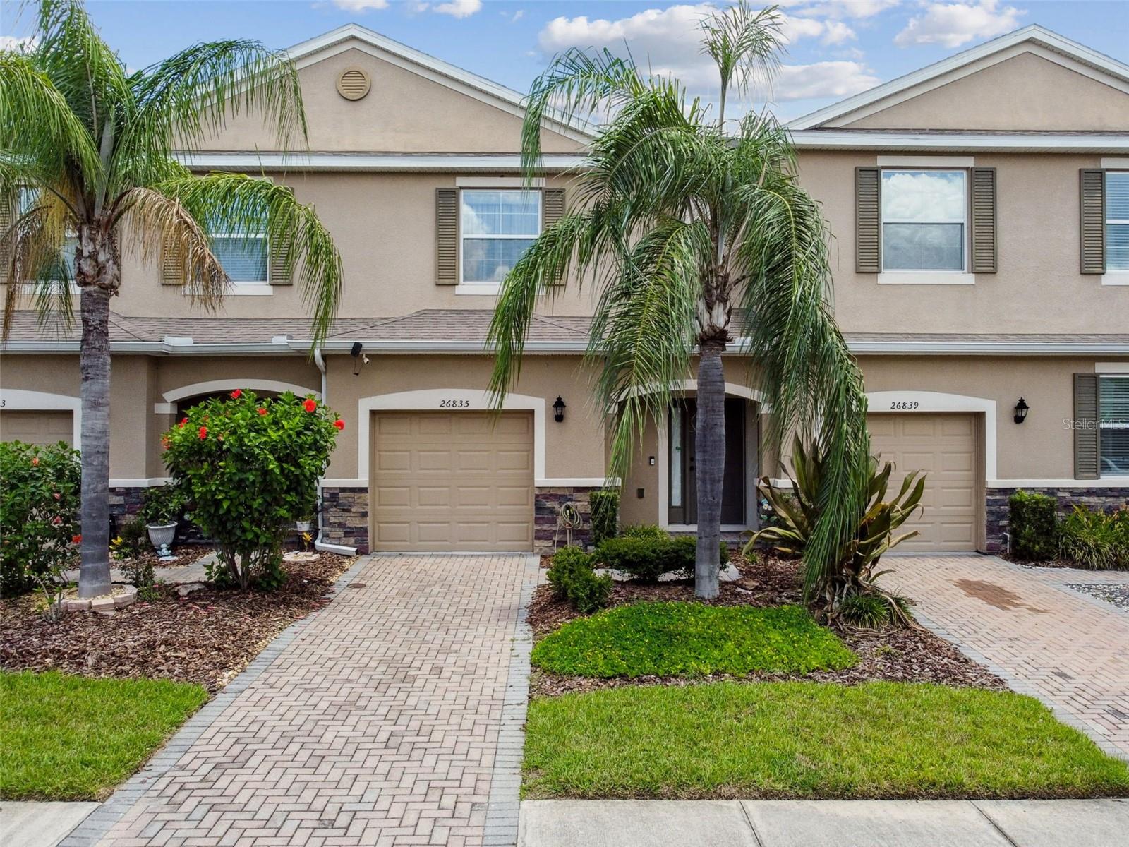 Welcome to a beautifully upgraded townhome tucked inside the highly desirable GATED village of
Seven Oaks! This IMMACULATE 3 bedroom, 2.5 bathroom townhome with a 1-car garage features
elevated craftsmanship, a SPACIOUS layout, and PREMIUM CONSERVATION VIEWS from every
room. The open concept living area is perfect for entertaining, while the screened lanai offers a
peaceful space to unwind. Thoughtfully designed and meticulously maintained, this residence
combines comfort, functionality, and style in one of WESLEY CHAPEL’S MOST SOUGHT-AFTER
NEIGHBORHOODS AND LOCATIONS.
Beyond CLEAN and incredibly well maintained, this MOVE-IN READY home showcases BLOCK ON
BLOCK CONSTRUCTION and NEW HIGH-END LAMINATE FLOORING UPSTAIRS completed with
the finest craftsmanship. The inviting kitchen is a dream for any cook or entertainer, featuring 42"
wood cabinetry, subway tile backsplash, thick granite countertops with ample prep space, counter
height seating, and NEWER STAINLESS STEEL APPLIANCES, including a sleek side-by-side
refrigerator and upgraded range.
The spacious master suite is a true retreat, offering double vanities, a large walk-in shower, and
walk-in closet complete with built-ins for maximum organization. All closets throughout the home
have built-in systems for extra storage. The screened lanai provides a quaint outdoor space to
unwind while enjoying STUNNING PRIVATE CONSERVATION VIEWS of the surrounding nature.
From top to bottom, this home feels fresh, open, and like-new!
This ENERGY-EFFICIENT home helps keep utility bills low and is located in a MAINTENANCE-FREE
COMMUNITY where lawn care, exterior paint, and the roof are all included for EASY LIVING!
Residents enjoy community amenities including multiple resort style pools, water slide, splash pad,
fitness center, tennis and basketball courts, and ENDLESS WALKING TRAILS through the
community and NATURE, perfect for active living and outdoor enjoyment.
Located just minutes from I-75 and I-275, this home offers quick access to everything Wesley
Chapel has to offer. Enjoy premier shopping, dining, and entertainment at Wiregrass Mall, The
Grove, KRATE, Tampa Premium Outlets, and Cooper’s Hawk Winery & Restaurant. Nearby, you’ll
also find TOP-RATED SCHOOLS (including Seven Oaks Elementary just a short walk away!),
WORLD-CLASS HEALTHCARE facilities, and endless recreational spots, making this a perfect place
to call home.
Welcome to the ideal blend of peaceful nature, luxury amenities, top schools, and convenience all
wrapped into a carefree lifestyle!