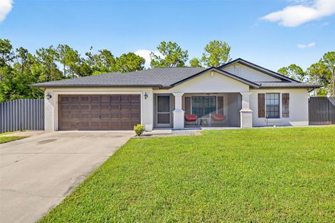 Photo of 421 Broadmoor Street, Lehigh Acres, FL 33974 (MLS # TB8476745)