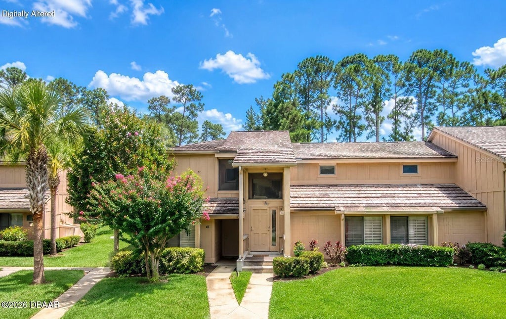 Photo of 149 Blue Heron Drive #C, Daytona Beach, FL 32119 (MLS # O6441045)