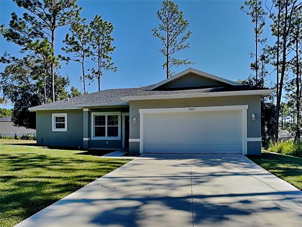 Photo of 7669 N Paris Drive, Dunnellon, FL 34434 (MLS # O6362095)