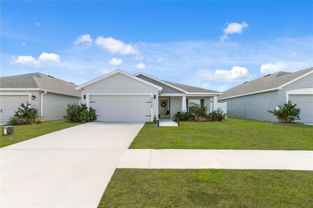 Photo of 35598 Bellington Boulevard, Zephyrhills, FL 33541 (MLS # O6387647)