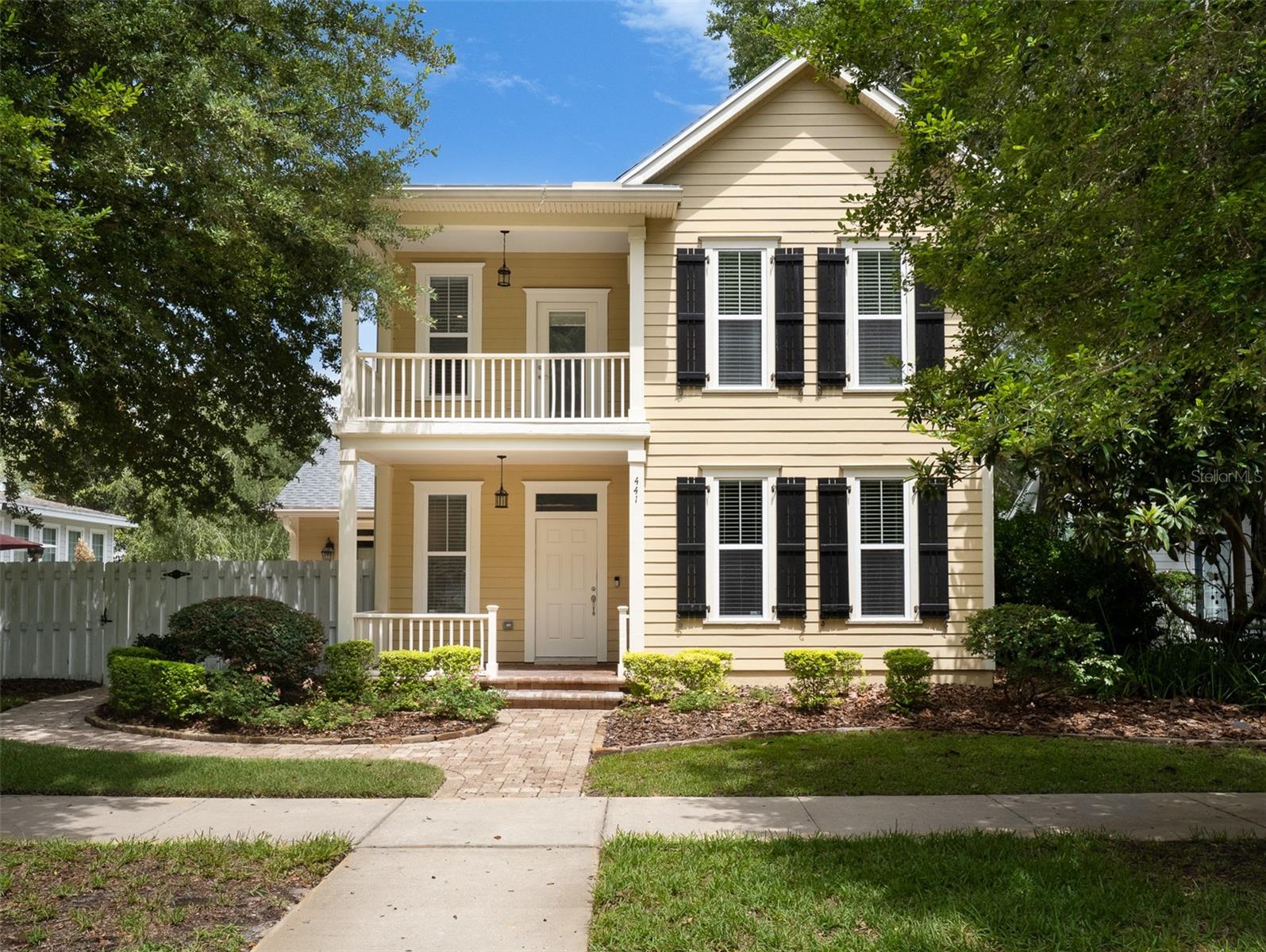 From its picture-perfect curb appeal to its unbeatable location across from the neighborhood promenade, this Town of Tioga home is the perfect setting for those who value both convenience and a connected lifestyle. Surrounded by tree-lined streets, sidewalks, and beautifully maintained green spaces, it’s ideally situated for enjoying everything this vibrant neighborhood has to offer.
Step inside to an inviting entryway that flows seamlessly into formal living and dining spaces—ideal for hosting guests or enjoying quiet evenings at home. Just beyond, a spacious family room opens to the kitchen, creating a warm and connected space for everyday living. Luxury vinyl flooring runs throughout, combining durability with timeless style. ~
The primary suite is tucked away on the main floor for added privacy and comfort, offering a peaceful retreat with generous space and natural light. Upstairs, you’ll find two additional bedrooms, an office nook, and a shared bathroom. The bedrooms both have access to a charming balcony, perfect for enjoying morning coffee or an evening breeze. ~
Multiple outdoor patios and privacy fencing provide even more space to unwind or entertain, allowing you to enjoy the beautiful Florida weather year-round. Just steps from your front door, enjoy access to neighborhood amenities including tennis courts, athletic fields, a community pool, and scenic paths. ~
With shopping, dining, and everyday essentials all nearby, this home offers a truly convenient lifestyle in one of Gainesville’s most sought-after neighborhoods. Don’t miss the opportunity to make this gem in the Town of Tioga your own.