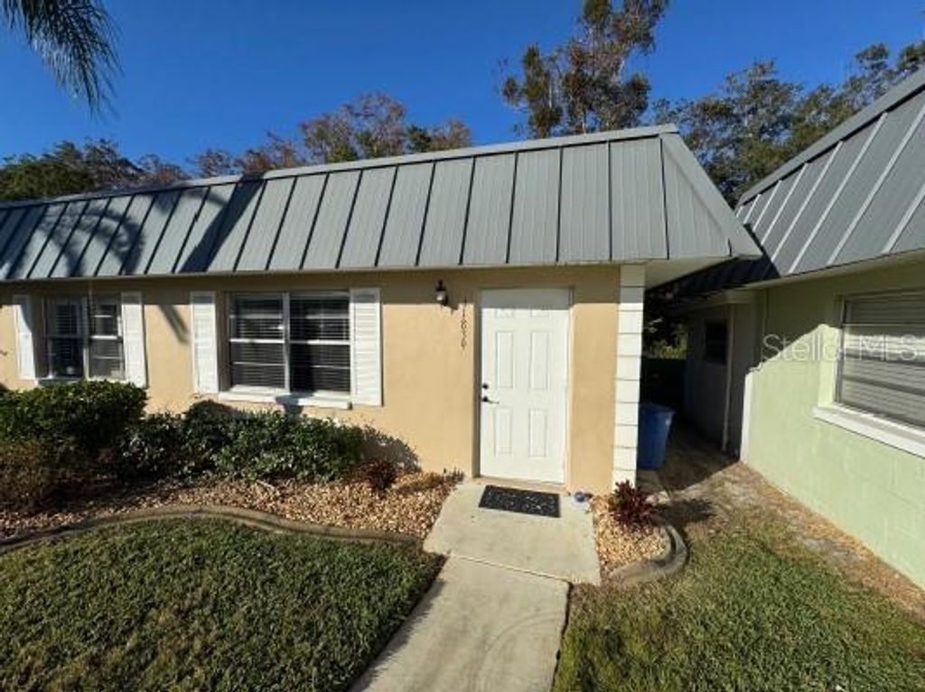 Photo of 11839 Bayonet Lane #11839, New Port Richey, FL 34654 (MLS # J984991)