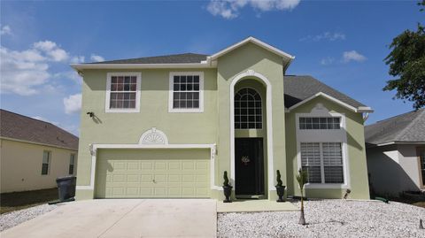 Photo of 339 Sigmund Loop, Davenport, FL 33837 (MLS # O6295794)