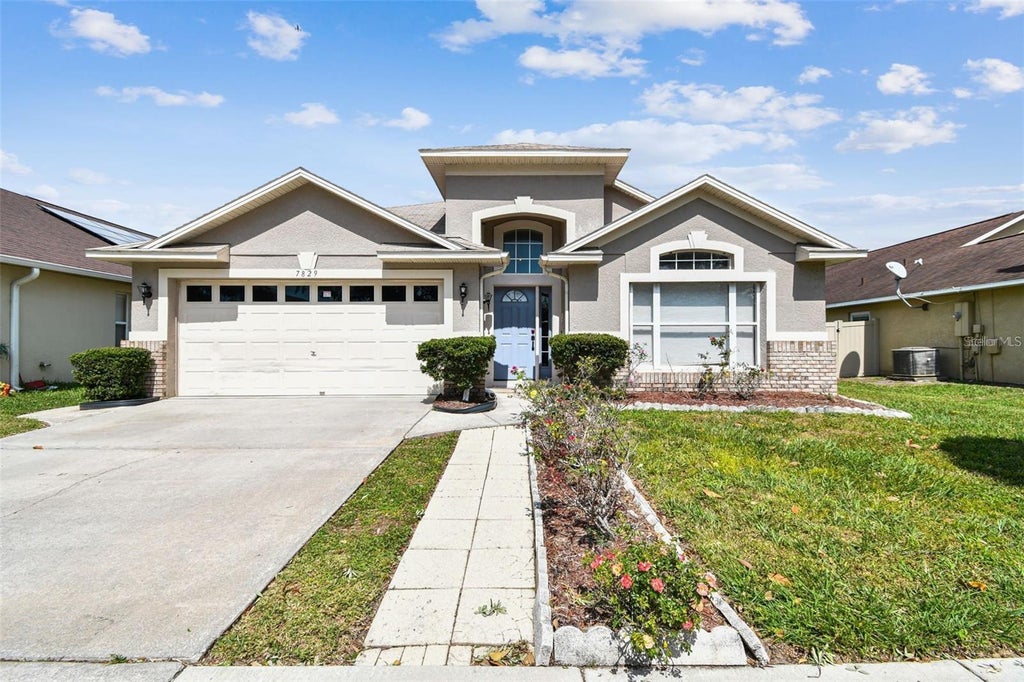 Photo of 7829 Elmstone Circle, Orlando, FL 32822 (MLS # O6412917)