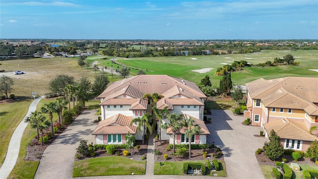 Photo of 7486 Divot Loop #7486, Bradenton, FL 34202 (MLS # A4665334)