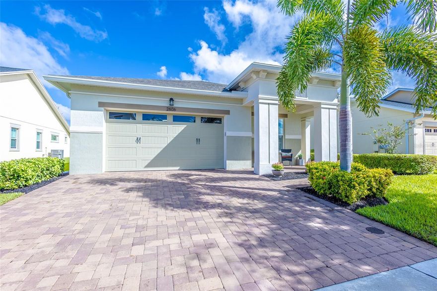 Welcome to Your Paradise at Twin Lakes, a Del Webb Community! This resort-style community for those 55 and better awaits your arrival. This amazing Marco model is one of the finest on a 70-foot lot, largest lot offered in the community. You won't have to wait until December 2026 for a new build on a 70-foot lot! This home offers a total of three bedrooms, two of which are primary suites, three full bathrooms, an office or flex area with an expansive covered and screened outdoor living space with a landing paver pad right outside your screen door, as well as a widened paver driveway for easy parking. This well-appointed home features an open floor plan, high ceilings, luxurious lighting, and a large open kitchen with a massive Island, with high end quartz countertops throughout, and a large pantry. The kitchen, a chef's dream, includes upgraded white cabinets with crown molding, tons of windows that bring in the natural light, and beautiful plantation shutters throughout. It is equipped with a gas cooktop in this upgraded Bistro Kitchen with a newer refrigerator! The 1st primary suite boasts a large spacious place to relax and rest and sitting area to read, a large shower with newer upgraded frameless enclosure, and a large walk-in closet. Easy access to a spacious laundry room with a utility sink and ample cabinet and countertop space. Two guest rooms, one with an ensuite bathroom and a second guest bath are located away from the primary suite in this split plan,  eight-foot doors are featured throughout. The home also includes a tankless gas water heater, a whole house Generac system, where you will have the peace of mind that you will never be without power in a storm, a water softener system, and a new high efficiency AC system. The very low community fees also cover lawn care, shrub care, mulch, sod, and irrigation. Amenities include a resort-style pool with beach entry and a separate hot tub, an Olympic-size lap pool, a grill house with covered seating, a 20,000-square-foot clubhouse with a fitness center, meeting rooms, a coffee bar, water stations, a craft room, a professional chef's kitchen, pool tables, ping pong, tennis courts, a putting green, walking trails, pickleball, fishing, and pontoon and Jon boats for resident use. A gathering house offers additional areas for socializing, with pool tables, ping pong, poker tables, and indoor and outdoor kitchens and bathrooms. The HOA fee is a low $358  monthly for all these amenities. The home is conveniently located near Lake Nona's Medical City, including the Veterans Hospital, theme parks, and Orlando International Airport (a 30-minute drive). The beaches and rocket launch in Brevard County are within 45 minutes. Schedule your private tour today.