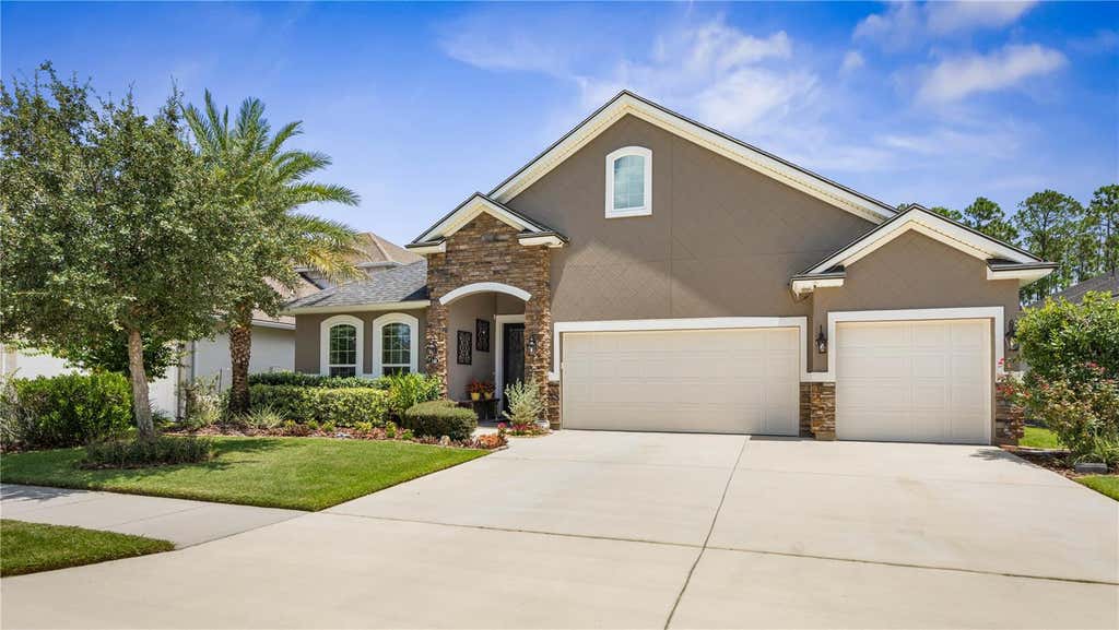 Photo of 148 S Coopers Hawk Way, Palm Coast, FL 32164 (MLS # FC320659)
