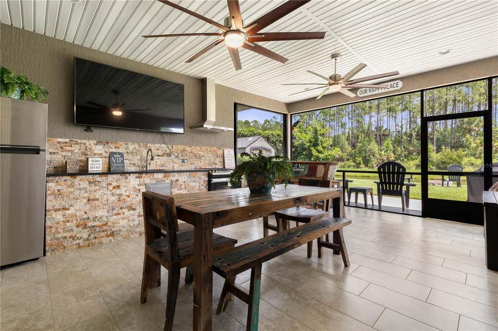 Photo of 148 S Coopers Hawk Way, Palm Coast, FL 32164 (MLS # FC320659)