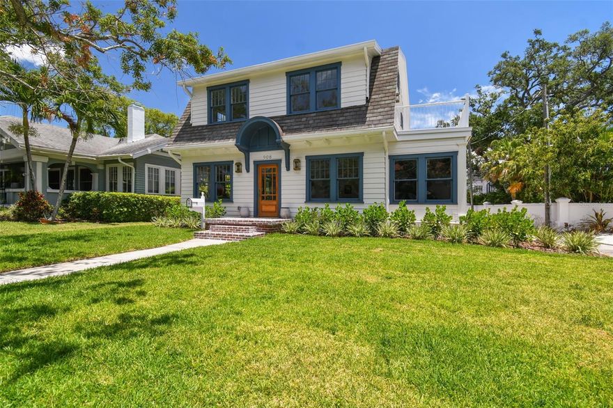 Nestled in the heart of historic Hyde Park, this original Dutch Colonial home stands as a rare gem, positioned just one house away from the picturesque Bayshore Boulevard. Steeped in history, this residence is making its second appearance on the market in the last 97 years, now boasting a complete transformation with meticulous remodeling and custom finishes. The home welcomes you with the charm of a bygone era, yet embraces modern luxury through thoughtful updates. As you explore the interior, you will be welcomed in by the new gleaming hardwood floors, fresh paint, carefully selected lighting fixtures, and the open feel of this home. The office, adorned with luxurious marble tile flooring, offers a sophisticated workspace that is flooded with natural light. Imagine working or studying in this elegant setting, surrounded by a full room of windows that invite the outdoors in, creating a truly inspiring environment. As you move through the downstairs, the kitchen stands as a focal point of both style and functionality. Custom cabinetry adds a touch of craftsmanship, while a large island provides ample space for culinary endeavors and social gatherings. The kitchen's design seamlessly blends classic charm with modern convenience, offering a perfect balance for both everyday living and entertaining. A pantry adds to the kitchen's practicality, providing additional storage space and ensuring that everything you need is right at your fingertips. This well-appointed kitchen is not only a culinary haven but also a central hub for gatherings and creating lasting memories with its open concept to the dining area and living room/den. Upstairs you'll discover three bedrooms upstairs, each exuding its own unique character. The dreamy master bedroom captures attention with its captivating views of the water, providing a serene backdrop to your daily retreat, where you can savor your morning coffee while taking in the scenic beauty that Hyde Park and Bayshore Boulevard offer.The master bathroom has double vanities, custom tiling, a large walk in shower, soaking tub, and a custom closet; no detail was missed. In addition to the main house's 2,553 square feet, this property boasts a 511 sq ft remodeled guest house that adds to its allure. The guest house offers water views, fully updated kitchen w/open living room concept, bedroom, newly updated bathroom with custom vanity and tile selection, and is a perfect retreat for guests. Other updates include: new roof, new a/c, new wiring, new plumbing, fresh landscaping, new paint throughout, and much more.  Walking distance to Hyde Park Village, Kate Jackson Park, and a bike ride to Downtown Tampa you do not want to miss this one of a kind home.