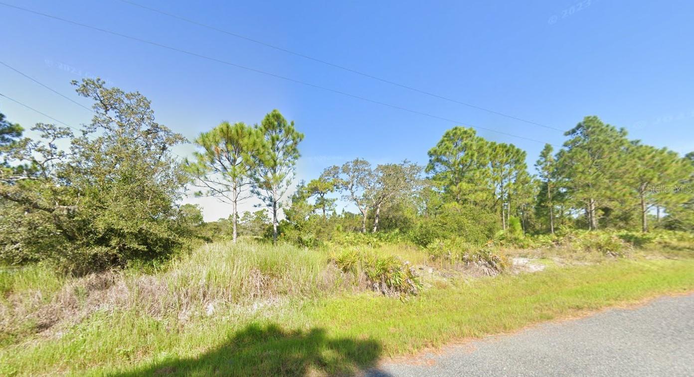 Wow!! Prime Corner Lot ~ 2.11 Acres of Pristine Land in an Ideal Location!! Incredible Price for this Large Tract of Land! OUT OF THE FLOODZONE!! High & Dry, No Wetlands Per the County. Come Build Your Dream Home, in Complete Privacy & Tranquility!! No HOA means Complete Freedom~ Bring Your Boat, RV and All the Toys!! The Established area of Okeechobee offers the Perfect Fusion of Peaceful Living and Accessibility to Amenities! Close Proximity to the Turnpike, SR 60 and 441 Allows You to Commute Seamlessly! Nearby Indian River Mall and an Array of Options for Shopping and Dining add to The Appeal of this Location!! Vero Beach is not far to Enjoy Endless Beach Adventures!! Make an Offer to Secure This Florida Gem as Your Own Today!!