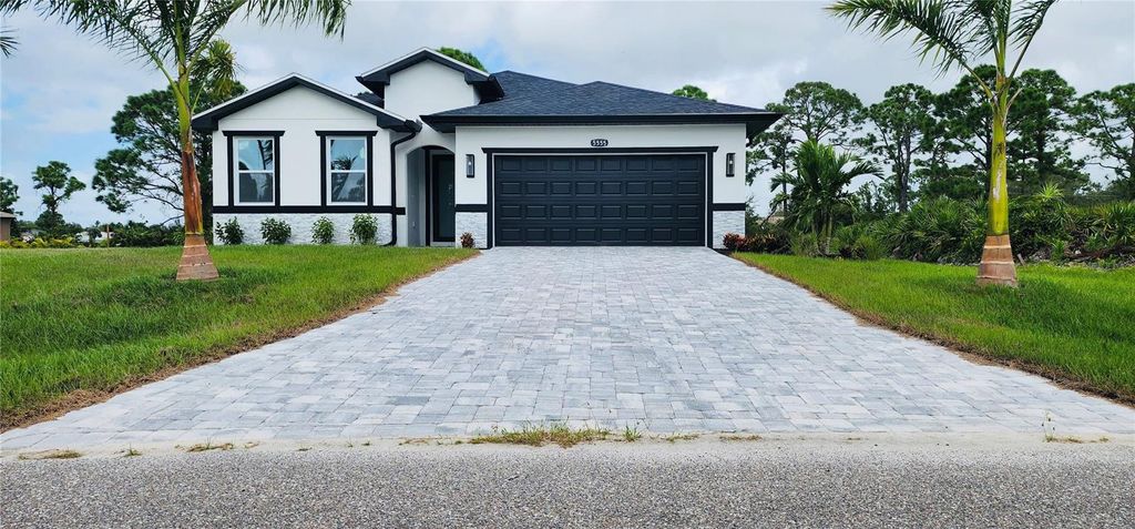 Photo of 5555 Veracruz Terrace, Port Charlotte, FL 33981 (MLS # TB8488632)