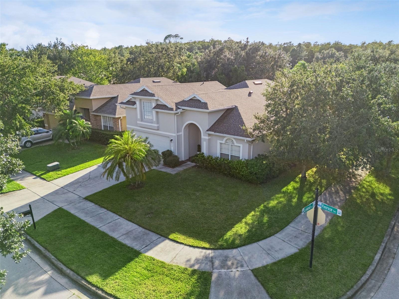 Welcome to this beautifully updated 4-bedroom, 3-bath home in the heart of Northlake Park at Lake Nona, located on a corner lot, across from a serene park! This move-in ready home features tall ceilings, abundant natural light, and a flexible floor plan with a private primary suite on the first floor and a second primary (or bonus suite) upstairs — ideal for guests or multi-generational living.
Enjoy peace of mind with a new roof and HVAC (2023), plus all-new luxury vinyl flooring, fresh paint, and a bright, open interior that feels like new. The expansive foyer welcomes you with soaring ceilings and accent lighting, flanked by two versatile flex spaces — perfect for an office, playroom, or home gym. Two secondary bedrooms and an updated full bath sit opposite, offering privacy and functionality. Upstairs, a spacious bedroom with ensuite bath can serve as a second primary or bonus room.
The stunning kitchen features 42” cabinetry, quartz countertops, stainless steel appliances, and a breakfast-bar island that flows into the generous living room with custom built-ins and a wine fridge. The main-floor primary suite offers a large walk-in closet and spa-like bath with dual sinks, quartz counters, a soaking tub, and a custom-tiled shower. French doors open to a private backyard with new sod and an extended patio — perfect for entertaining.
With park views from your front door, two flex spaces, and top-rated schools nearby, this home truly has it all. Enjoy Northlake Park’s year-round community events and HOA-included YMCA membership with an Olympic-size pool, tennis courts, and sports fields. Experience Lake Nona living at its finest! You don't want to miss this special home! Make your appointment for a private tour today!