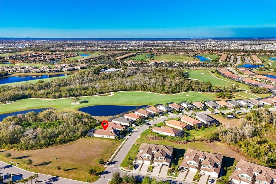 Welcome to 6070 Brandon Run, an exceptional four-bedroom luxury residence set within the highly desirable, guard-gated Lakewood National Golf Club, where refined living meets an unparalleled resort lifestyle in the heart of Lakewood Ranch. This beautifully appointed home offers a unique blend of elegance, comfort, and privacy, thoughtfully designed to capture the essence of upscale Florida living. From the moment you arrive, the residence impresses with its timeless curb appeal and meticulous attention to detail, leading into expansive interiors filled with natural light, gracious proportions, and seamless indoor-outdoor flow. The well-designed four-bedroom layout provides remarkable flexibility, ideal for hosting guests, accommodating family, or creating a private home office or wellness retreat, while maintaining an atmosphere of calm and cohesion throughout. At the heart of the home, open living spaces connect effortlessly to the private lanai—your personal sanctuary—where mornings begin with quiet coffee moments and evenings unfold with sunset cocktails amid serene views and lush surroundings. Whether you are relaxing, dining alfresco, or simply unwinding in complete privacy, the expansive lanai elevates everyday living into a resort-inspired experience. Beyond the home itself lies the true distinction of Lakewood National Golf Club, a community celebrated for its world-class amenities and vibrant lifestyle. Residents enjoy exclusive access to two championship, 18-hole golf courses that are both beautifully designed and delightfully challenging, appealing to seasoned golfers and enthusiastic newcomers alike. These meticulously maintained courses are complemented by a grand clubhouse offering fine and casual dining, an elegant bar and lounge, and a full calendar of social events that foster a dynamic sense of community. Additional amenities include a resort-style pool with lap lanes and waterfalls, a state-of-the-art fitness center, spa services, lighted tennis and pickleball courts, bocce, and miles of scenic walking trails, all designed to support an active, social, and indulgent lifestyle. Perfectly positioned within Lakewood Ranch, one of the nation’s most desirable master-planned communities, this residence offers convenient access to upscale shopping, dining, top-rated schools, medical facilities, and the cultural attractions of Sarasota, while Gulf Coast beaches remain just a short drive away. At 6070 Brandon Run, luxury is not merely a feature—it is a way of life, where elegant interiors, a private outdoor retreat, and exceptional golf and resort amenities combine to create an extraordinary opportunity to live, relax, and entertain in one of Florida’s most sought-after golf communities.