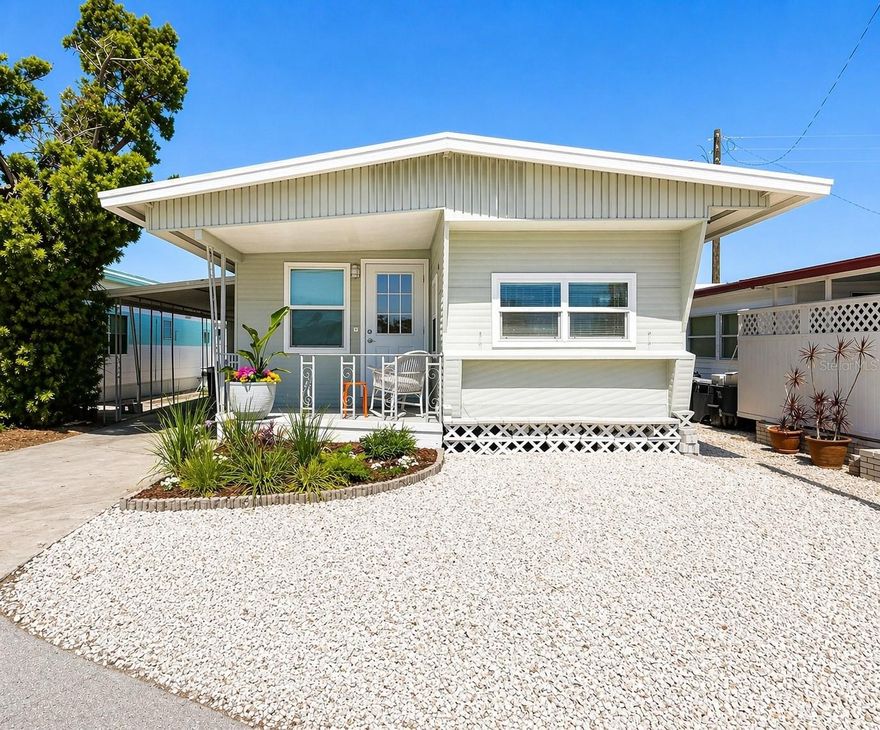 Completely renovated from the studs out, this beautifully updated 2-bedroom home offers a fresh, modern feel with thoughtful design throughout. From the moment you step inside, you’ll notice the attention to detail—from the butcher block countertops and tile backsplash with soft-close cabinets to updated flooring and abundant storage that enhances both style and functionality.

The layout is designed for comfortable living, with a clean, open feel that makes the home both inviting and practical. Recent improvements include new windows, a newer A/C and water heater, and a resealed roof, providing added peace of mind.

One of the standout features is the extra-large carport, offering ample space for parking, storage, or outdoor living. The home is being sold furnished, making it truly move-in ready.

Located in Trailer Estates, a Special Park and Recreation District governed under Chapter 418, Florida Statutes, residents own their land, with no lot rent, CDD, or HOA fees. The annual park tax covers cable, high-speed internet, trash pickup, fire and rescue services, and access to outstanding amenities, including a marina with rentable boat slips, private beach, pool, hot tub, fitness center, shuffleboard, bocce ball, pickleball, woodshop, and nearly 60 active clubs and social events. Experience one of Sarasota Bay’s most vibrant and welcoming 55+ communities.