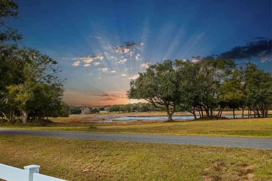 A Pilot’s Dream Community —Loves Landing is a premier gated fly-in community where aviation and country living come together. This vacant lot measures approximately 180 ft by 150 ft and is ideally suited for building your custom home and private aircraft hangar, with direct access to one of two private airstrips. The nicely shaped lot offers a tranquil view of Horseshoe Pond and provides the perfect setting for your future dream home. This lot will comfortably fit a 2600 square foot home and 50 by 50 air hanger.  Residents enjoy privacy, security, and a strong aviation-focused community, all while being conveniently located near The Villages with easy access to medical facilities, shopping, dining, and entertainment. Aviation Details: FAA Identifier: 97FL, Field Elevation: 80 feet, Private-use airstrips (prior permission required for landing), N/South Runway: 3,700 ft x 125 ft, E/W Runway: 2,500 ft x 100 ft. Enjoy peaceful country living nestled within a private airstrip community designed for pilots and aviation enthusiasts. Loves Landing offers a rare opportunity to live where your aircraft is just steps from home.