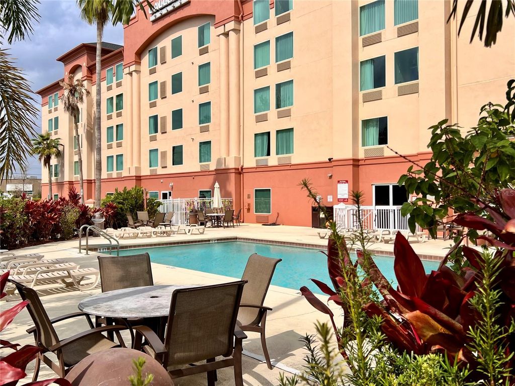 Photo of 3000 Maingate Lane #122, Kissimmee, FL 34747 (MLS # S5140499)