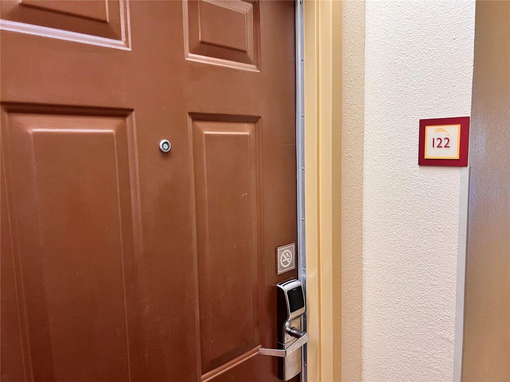 Photo of 3000 Maingate Lane #122, Kissimmee, FL 34747 (MLS # S5140499)