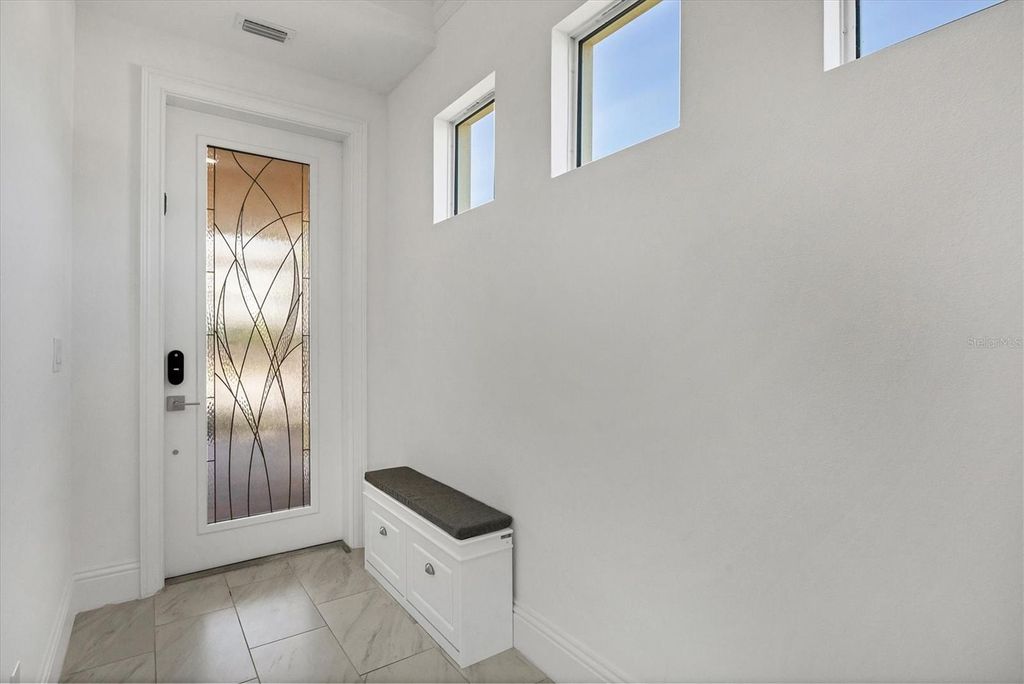 Photo of 7835 Hidden Creek Loop #101, Bradenton, FL 34202 (MLS # A4678914)