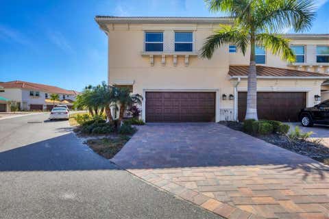 Photo of 7835 Hidden Creek Loop #101, Bradenton, FL 34202 (MLS # A4678914)